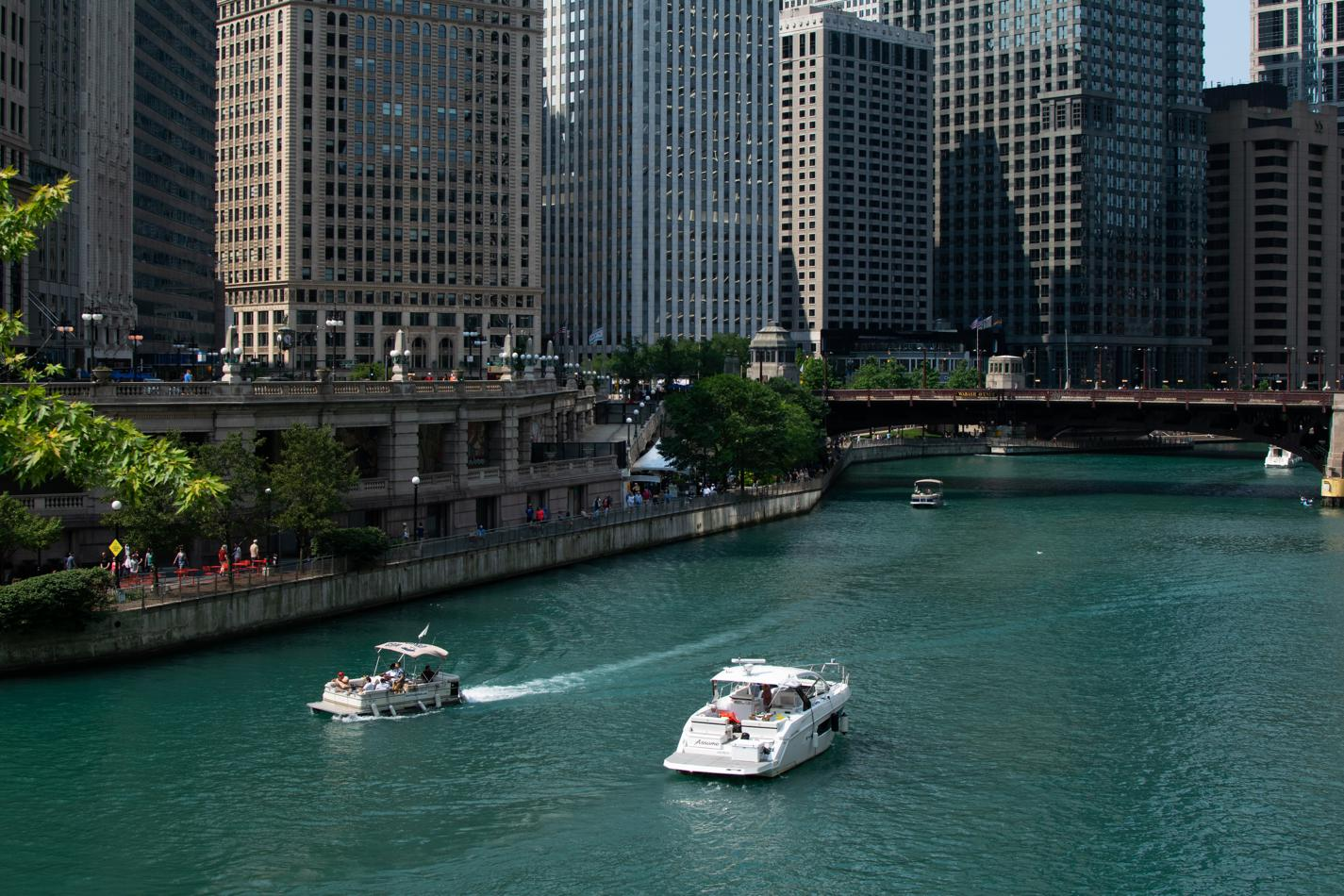 A view of boats in the Chicago riverwalk.